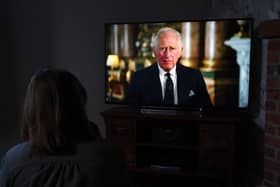 A child watching a broadcast of King Charles III first address to the nation as the new King following the death of Queen Elizabeth II on Thursday. Picture date: Friday September 9, 2022.