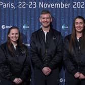 Meganne Christian (L), John McFall (C), and Rosemary Coogan (R) pose during a ceremony to unveil the European Space Agency new class of career astronauts in Paris on November 23, 2022