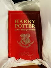 The leather-bound special 15th  anniversary edition of Harry Potter and the Philosophers Stone -  published exclusively for the competition in 2012.