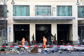 Berlin’s AquaDom aquarium containing 1,500 tropical fish bursts causing major flooding on nearby streets.