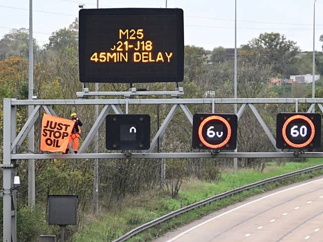 Just Stop Oil protests on overhead gantries brought traffic to a standstill on the M25 across four days in November 2022(Photo by Leon Neal/Getty Images)