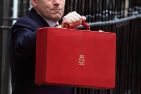 The red briefcase being held by chancellor Gordon Brown in 2007 (Photo: Getty) 