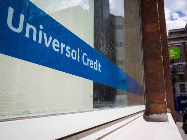  A Universal Credit sign in the window of the Job Centre in Westminster.