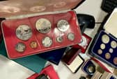The secret collection, which includes a William III crown dating back to 1696, could fetch in excess of £17,500 at auction.