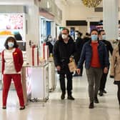 Face masks will be compulsory in shops and on public transport in England from Tuesday (29 November) (Photo: Getty Images)
