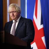 Prime Minister Boris Johnson speaks during a press conference after cases of the new Covid-19 variant were confirmed in the United Kingdom on November 27, 2021 in London, England. UK authorities confirmed today that two cases of the new Omicron Covid-19 variant, which had prompted a flurry of travel bans affecting several countries in Southern Africa, were found in the UK. (Photo by Hollie Adams/Getty Images)