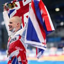 Adam Peaty of Team Great Britain celebrates after winning the gold medal in the Men's 100m Breaststroke Final on day three of the Tokyo 2020 Olympic Games (Photo: Maddie Meyer/Getty Images)