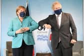 Prime Minister Boris Johnson greets German Chancellor Angela Merkel, ahead of a bilateral meeting during the G7 summit in Carbis Bay (Photo: Stefan Rousseau - WPA Pool/Getty Images)