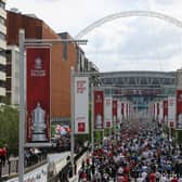 A fan was arrested at Wembley yesterday for wearing an offensive Hillsborough shirt