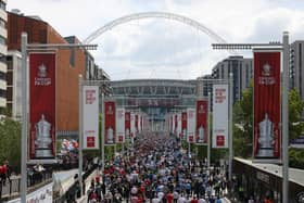 A fan was arrested at Wembley yesterday for wearing an offensive Hillsborough shirt