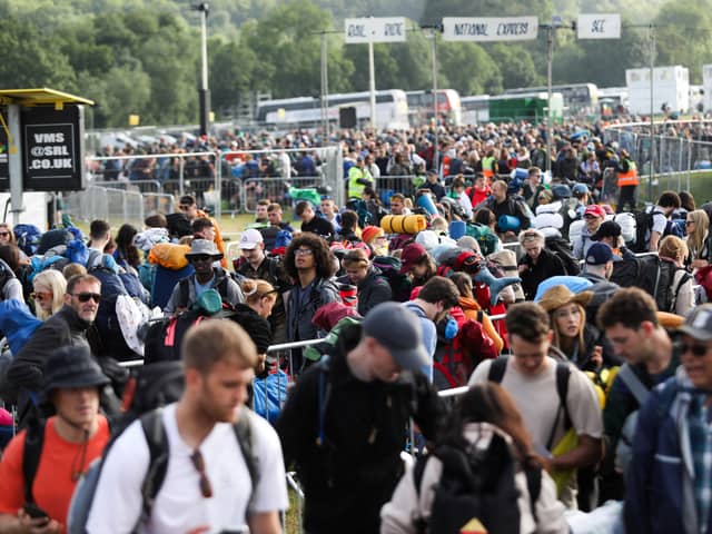 People head in to Glastonbury Festival after Emily Eavis officially opened the festival. 