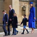 Prince and Princess of Wales with their three children 