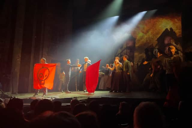 Just Stop Oil protesters locked themselves to the Sondheim Theatre stage with flexible bike locks. (Credit: Just Stop Oil/PA Wire)