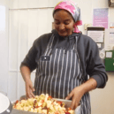 One of the Kitchen of Hope chefs preparing some food