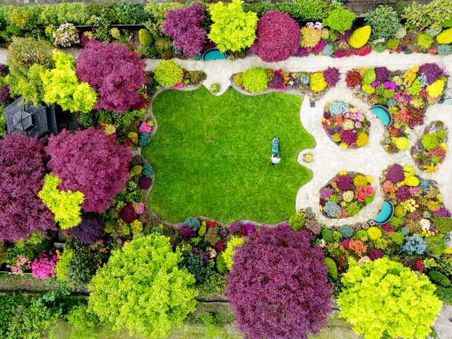 Tony and Marie Newton, and their colourful garden, Four Seasons, in Walsall. May 8 2024.  