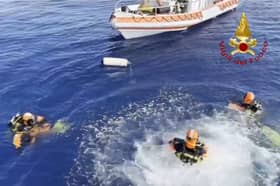 Search and rescue operation underway after yacht sinks.