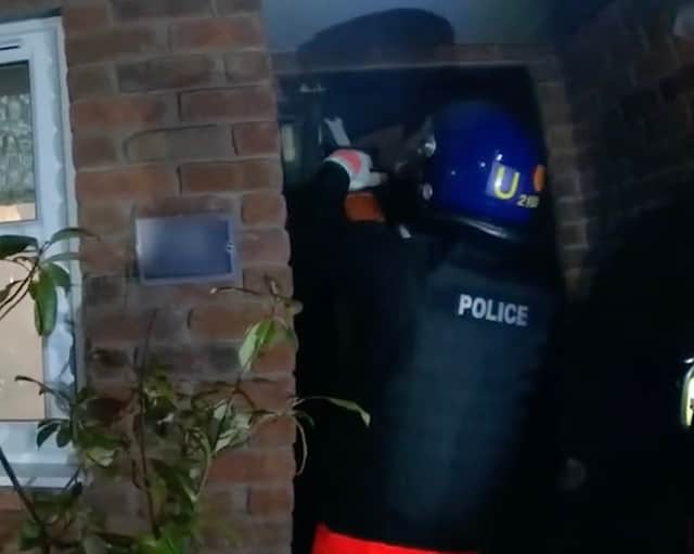 Body worn footage shows officers before a raid on a suspected gangster's home in West Midlands.