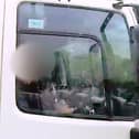 Shocking footage shows HGV driver caught eating yoghurt at the wheel