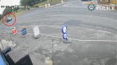 Man falls from car after clinging on after bag theft.
