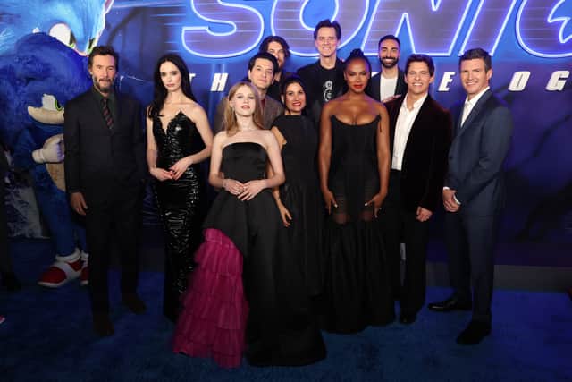 (L-R) Keanu Reeves, Krysten Ritter, Ben Schwartz, Adam Pally, Alyla Browne, Jim Carrey, Tika Sumpter, Lee Majdoub, James Marsden, and Jeff Fowler attend the "Sonic The Hedgehog 3" Los Angeles premiere at the TCL Chinese Theatre on December 16, 2024, in Hollywood, California.