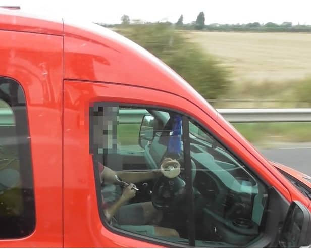 A driver was caught eating cereal at the wheel