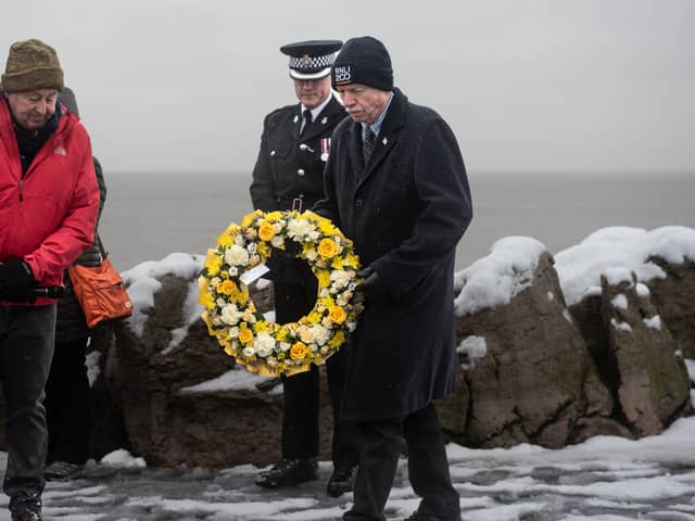 Paying respects at the Gynn Square memorial service to officers who died in the 1983 rescue mission at Blackpool.|Lucinda Herbert, Blackpool Gazette
