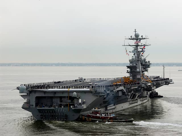 A fighter jet fell off the side of the American aircraft carrier USS Harry S. Truman while she was deployed in the Red Sea.