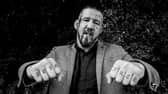 Bare knuckle fighter poses for photograph