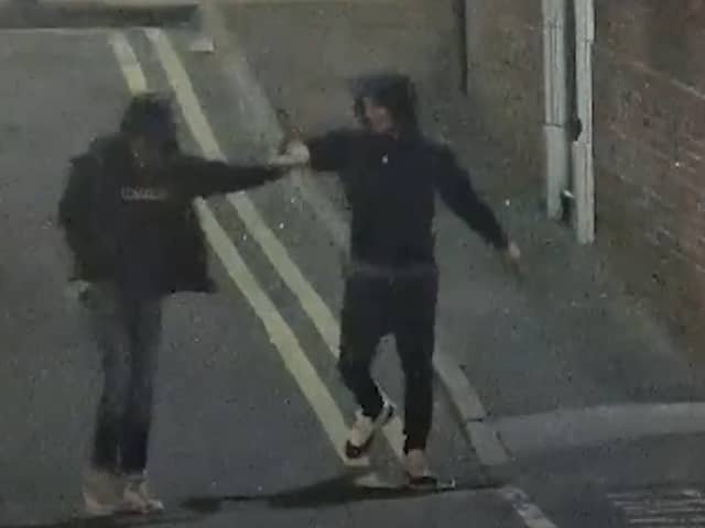 Ramaray Treasure and Leon Sykes fist bump moments after raining blows on a man with West Street with knives in hand.