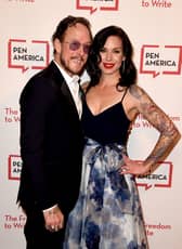 The wife of Weezer bassist Scott Shriner has been booked for attempted murder after an altercation with Los Angeles police on Monday afternoon.