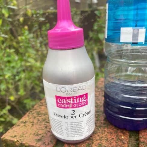 A bottle containing acid found on Martins when he was arrested.