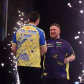 Luke Humphries (L) and Luke Littler (R) after a Premier League Darts match
