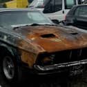 A burnt 1972 Mustang