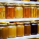A wide range of honey jars on UK shelves – but nearly half could be adulterated with sugar syrup, according to EU tests