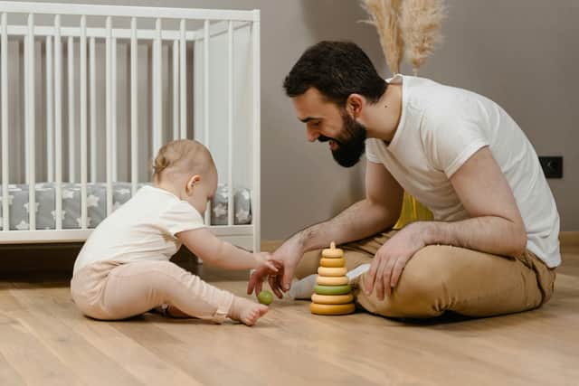 Talking, singing, or playing simple games like peekaboo with your babies can help support their development.
