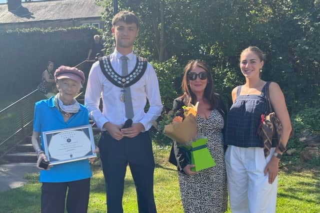 Kazia (left) with her 'Platinum Award' from Wetherby Town Council at the opening of Sandringham Park play area in 2025.