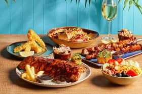 FEAST FOR LESS: Harvester diners can enjoy big savings on family favourites, with deals from Groupon.