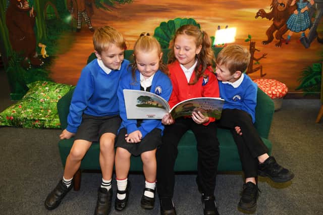 Opening of Starbeck Primary Academy School library - Pupils Henry Bloor, Elenor Bloor, Sydney Dean and Sebastian Dean. (Picture Gerard Binks)