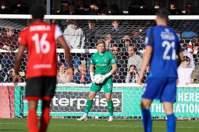 On-loan Bolton Wanderers goalkeeper Luke Hutchinson kept a third consecutive clean-sheet as Harrogate Town won on the road at Woking FC. Picture: Matt Kirkham