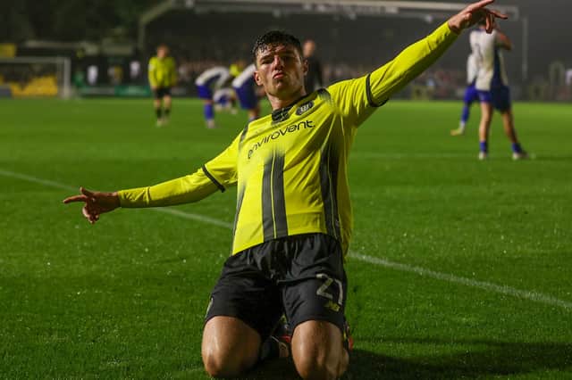 Ellis Taylor celebrates after firing Harrogate Town into a 2-1 lead against Bury FC. Picture: Matt Kirkham