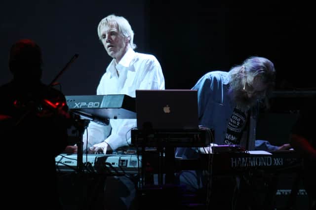 Wally band member Nick Glennie-Smith co-composed The Rock (1996), alongside contributions to major films like The Lion King and Crimson Tide.