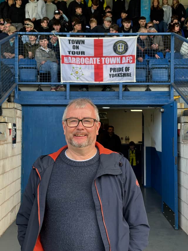 With the fans - The Harrogate Advertiser's Graham Chalmers at the Town end of Bury FC's stadium.
