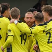 Harrogate Town's players celebrate after George Thomson fired them into a three-goal lead at home to Sutton United. Picture: Matt Kirkham