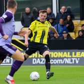 Bailey Hobson curls home Harrogate Town's opening goal during their 3-1 home win over Sutton United. Picture: Matt Kirkham