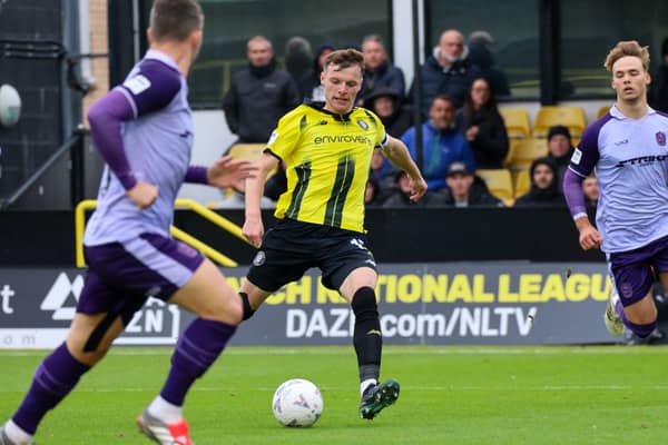 Bailey Hobson curls home Harrogate Town's opening goal during their 3-1 home win over Sutton United. Picture: Matt Kirkham