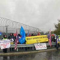 Protestors brave torrential weather to stage demonstration outside RAF Menwith Hill calling for base to close