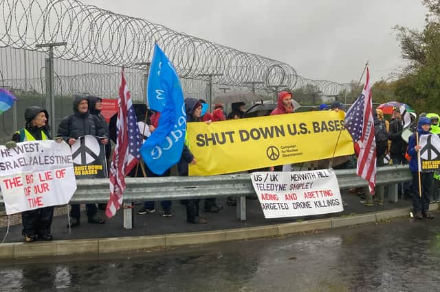 Despite heavy rain and strong winds, campaigners staged a demonstration outside RAF Menwith Hill in North Yorkshire on Sunday (October 25), calling for the closure of the military intelligence base