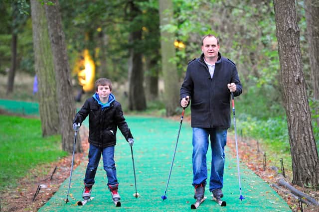 Dad and boy Nordic skiing at Stockeld Park in 2012.