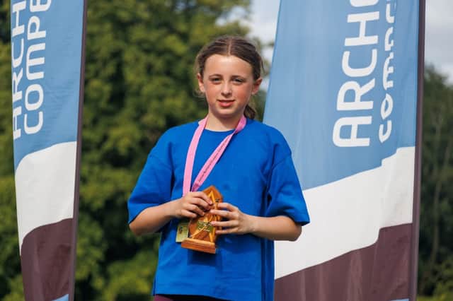 Matilda George shows off her trophy following her recent success at the National Clout Championships. Picture: Submitted