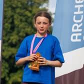 Matilda George shows off her trophy following her recent success at the National Clout Championships. Picture: Submitted